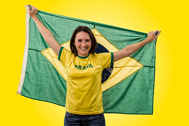 istock Female Brazilian fan celebrating 495653495