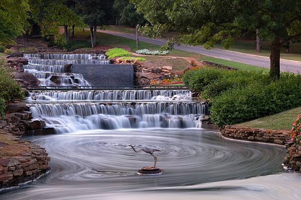 Hampton Cove Waterfall This manmade waterfall is a landmark for anyone in the Huntsville, Alabama area. huntsville alabama stock pictures, royalty-free photos & images