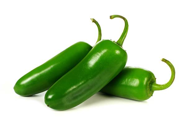 istock Group of jalapeno peppers over white 495655879