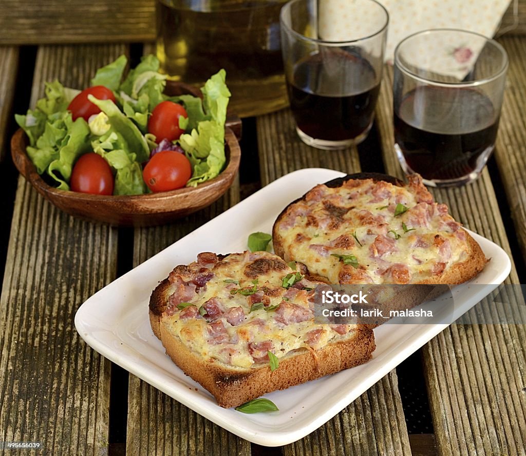Warm open faced sandwiches with ham, cheese Appetizer Stock Photo