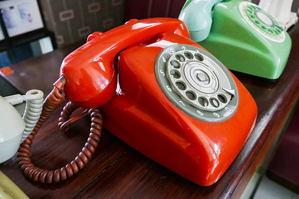 old dialling telephone old red, green dialling telephone for vintage style decoration dialling phone stock pictures, royalty-free photos & images