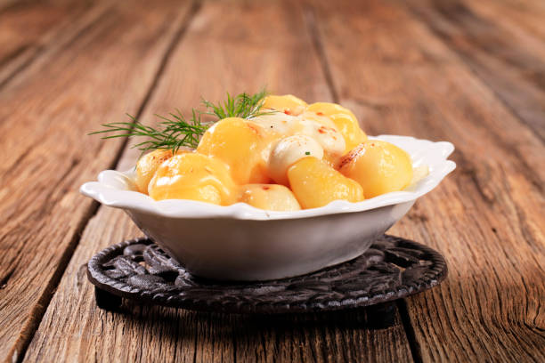 Bowl of potatoes with mozzarella cheese