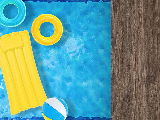 istock summer fun with inflatable toys floating on pool top view 495662060