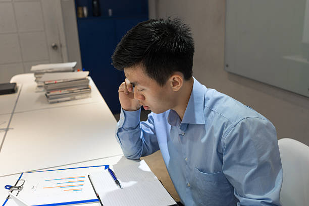 istock Manager call employee to ask about wrong information on report 495663494