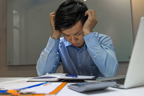 istock Headache is always a normal disease of office employee 495664608