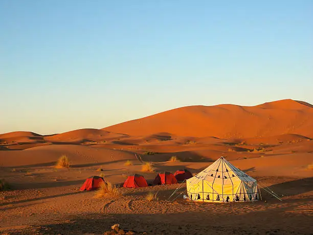 Tent in the desert with blue sky