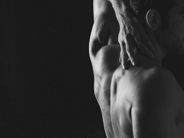 os músculos - rear view human arm naked men imagens e fotografias de stock