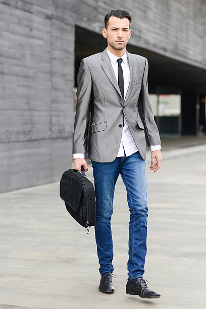 istock Young businessman near a office building 495666211