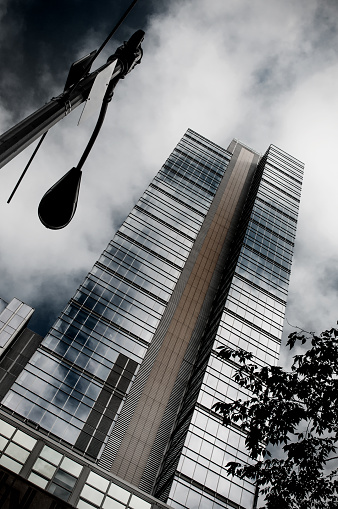 A skyscraper in downtown Seattle, Washington set against the clouds.