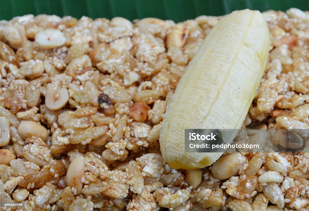 sweet made of rice nut sesame eat with golden banana sweet made of rice nut sesame eat with golden banana for Thai merit day 2015 Stock Photo