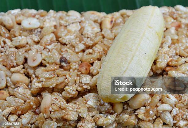 Sweet Made Of Rice Nut Sesame Eat With Golden Banana Stock Photo - Download Image Now