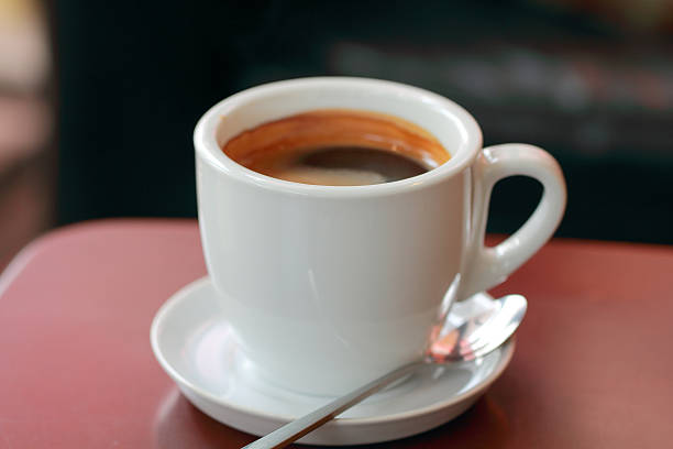 black coffee in white mug stock photo