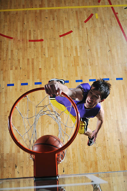 istock basket ball game player at sport hall 495667909