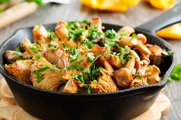 istock Fried chanterelle mushrooms in a creamy sauce 495668869