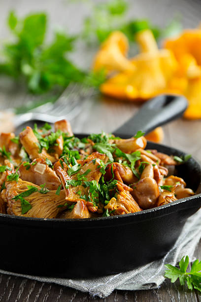 istock Fried chanterelle mushrooms in a creamy sauce 495668873