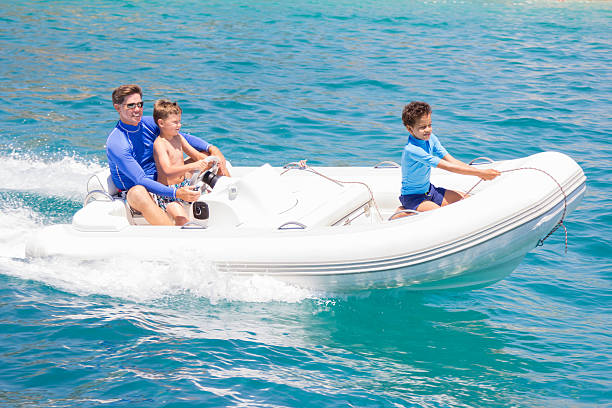 istock kids adventure on motor boat 495668916