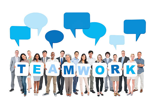istock Diverse Business People Holding Word Teamwork and Speech Bubbles 495668963