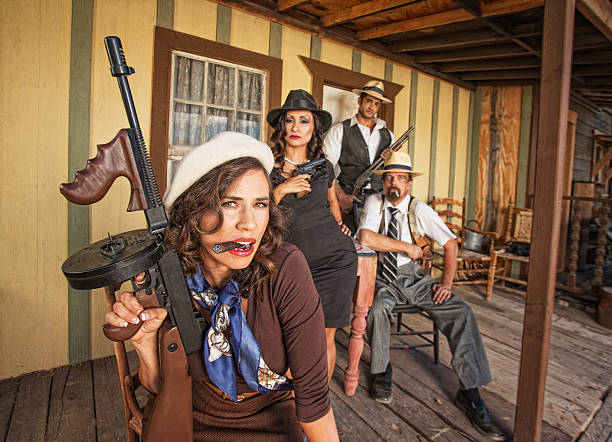 istock Pretty Woman with Submachine Gun 495669099