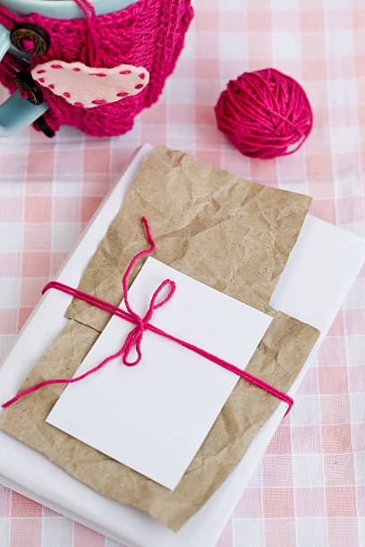 istock Old notebook with a dry branch of rosemary for notes 495669304