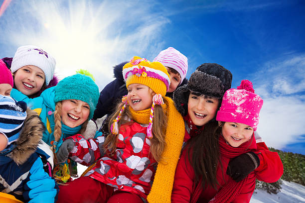 istock Group of happy kids outside 495670469