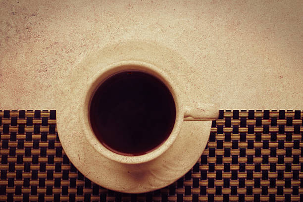 white cup of dark coffee stock photo