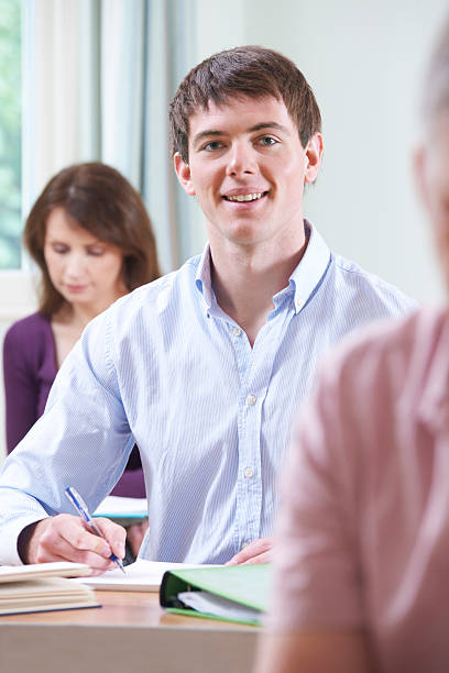istock Young Man In Adult Education Class 495672019