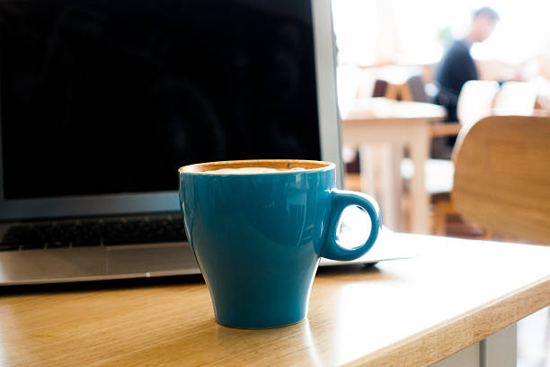 istock Laptop and coffee on desk 495672546