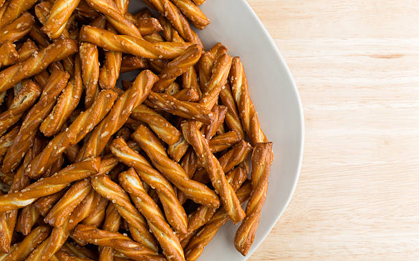 istock Braided pretzels on a plate and table top 495673800