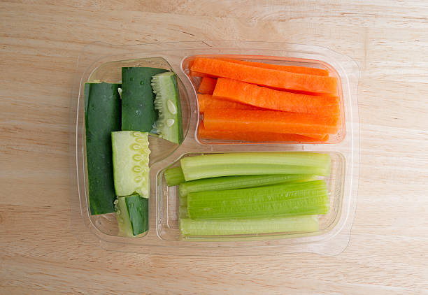 istock Carrots celery and cucumbers in a plastic tray 495674734