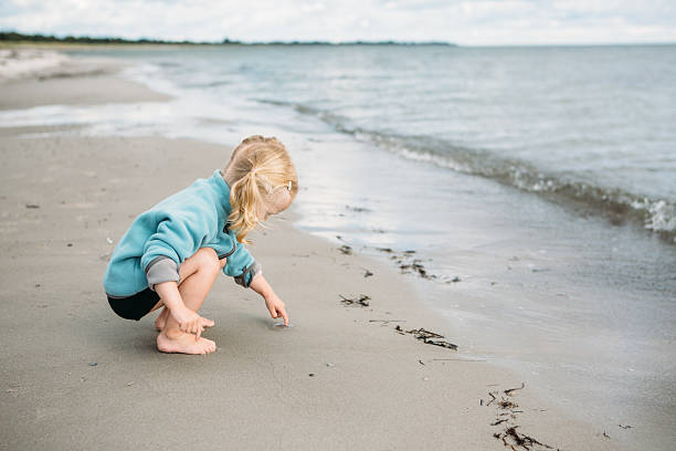 istock Toddler girl at the beach 495674904