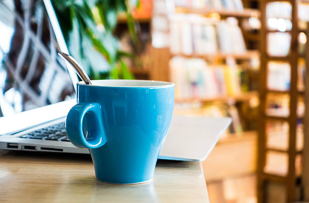 istock Laptop and coffee on desk 495674914