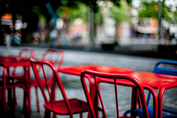 red outdoor chairs stock photo