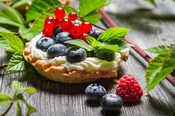 istock Forest cupcake with berry fruits 495686009
