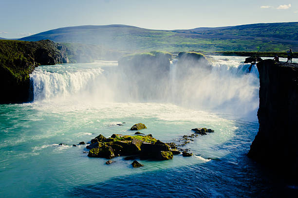 Beautiful vibrant panorama picture with view on waterfall in iceland SONY DSCBeautiful vibrant landscape picture of famous Icelandic Waterfall in Iceland hraunfossar stock pictures, royalty-free photos & images