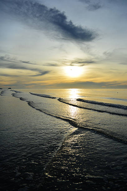 istock Early morning sunrise on the beach. 495688415