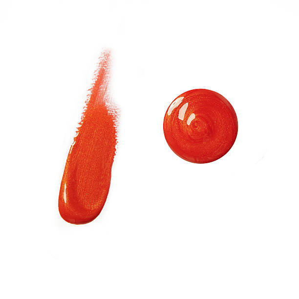 istock red orange smeared lip gloss on white background 495690578