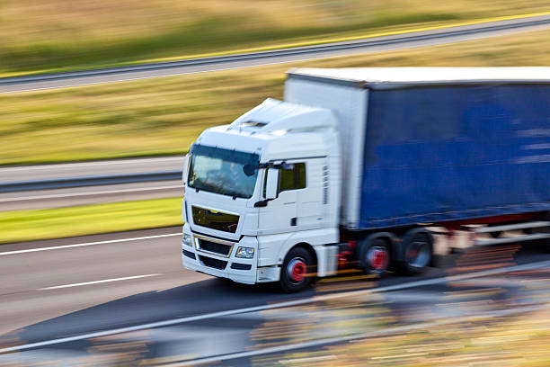 istock lorry on motorway with motion blur 495690665