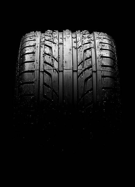 istock Tire close up on black background 495690955