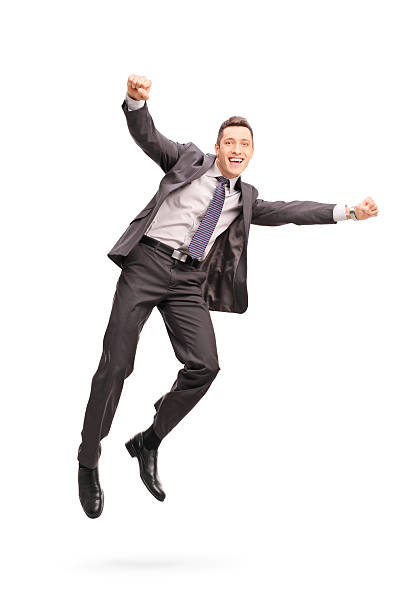 istock Joyful businessman jumping in the air 495691164