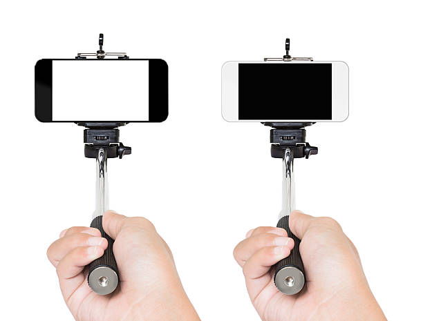 istock hand holding selfie stick isolated white 495691612