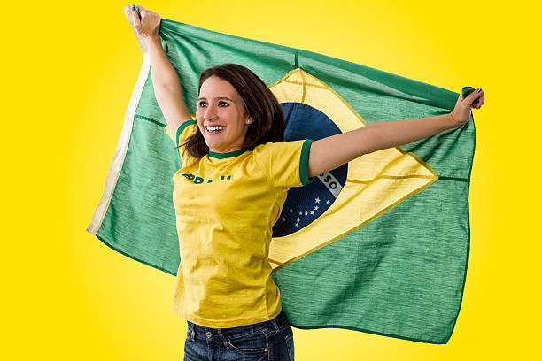 istock Female Brazilian fan celebrating 495691971