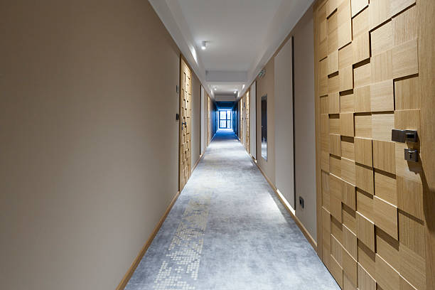 istock Hotel corridor with interesting wooden doors 495692109