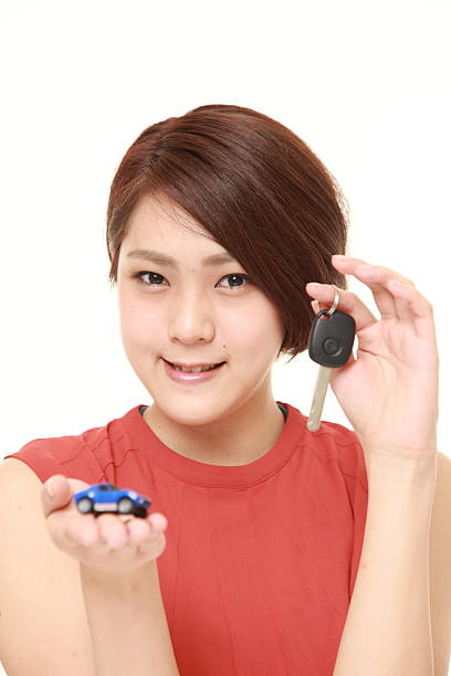istock Japanese woman get a new car 495693688