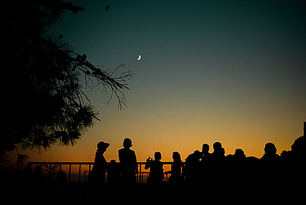 istock Group of young people watching sunset 495694128
