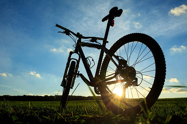 istock Silhouette of Mountain bicycle at sunset 495694328