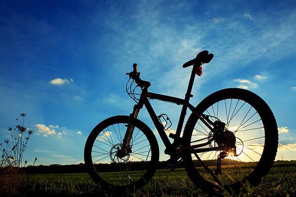 istock Silhouette of Mountain bicycle at sunset 495694360