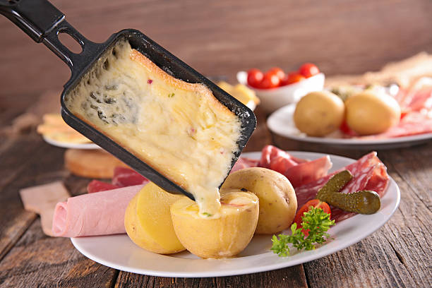 раклетт - raclette cheese стоковые фото и изображения