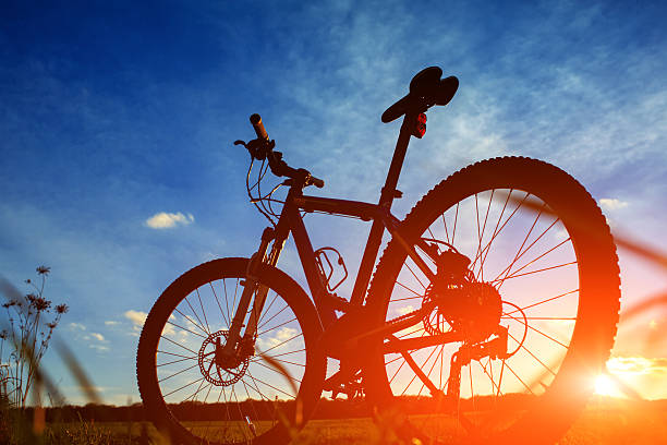 istock Silhouette of Mountain bicycle at sunset 495695340