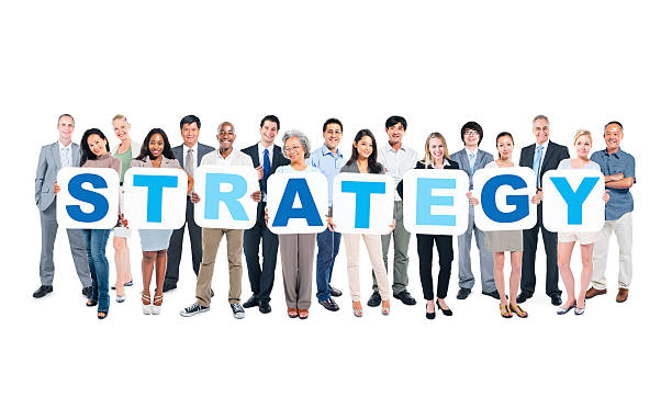 istock Group of Business People Holding Word Strategy 495695595