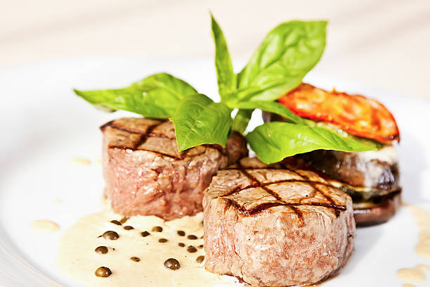 istock Grilled veal medallions with vegetables 495696195